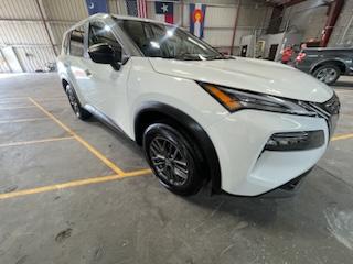 White Nissan Rogue side angle after detail